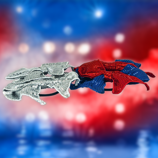 Flying superkids hårpynt til børn. Hårpyntet er i sølv blå og rød